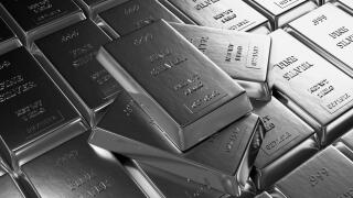 Close up view of Silver bars or ingots in bank vault background. Precious metal.3D illustration .