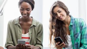 Friends using mobile phone