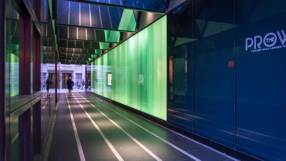 Wilder Walk, a new alley near Piccadilly Circus featuring light installation encased within layered glass panels along the sides of the alley, Soho, L