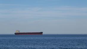 Copenhagen, Denmark - August 6, 2015: A container ship sailing towards Copenhagen harbour.