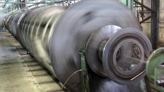 Cable drums turn on the conductor and cabling machine at Prysmian Cablefactory in Schwerin, Germany, 20 April 2010. For the equipment of the new coal powerhouse in the harbour of Rotterdam, the German company with 320 employees has delivered the first bar