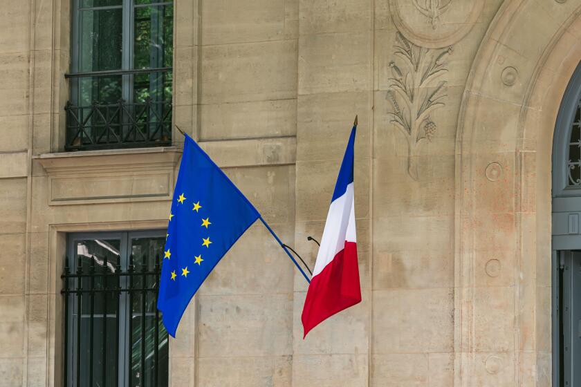 European union and French flags on the building