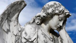 religion statue sad