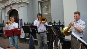 St Petersberg Brass Baroque Quartet busking on the street during Abergavenny Food Festival Monmouthshire South Wales UK