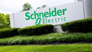 A logo sign outside of a facility occupied by Schneider Electric in Lexington, Kentucky on July 1, 2017.
