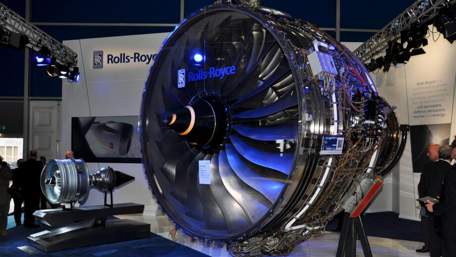 Rolls Royce Engines trade stand at the Farnborough International Airshow trade fair 2012, UK, with a Trent 1000 aero engine on display