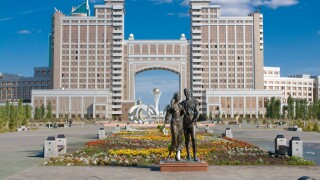 The Kay Munay Gaz building and the Bayterek monument, Astana, Kazakhstan, Central Asia