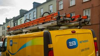 ESB Networks (national Irish electricity company) works van with ladders on roof parked in Skibbereen, County Cork, Ireland.