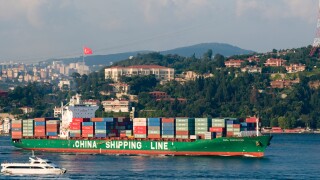 Cargo ship crossing Bosporus Strait Istanbul Turkey