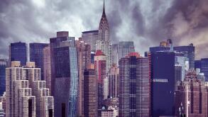 Manhattan skyline on a cloudy day, vintage color toning applied, New York City, USA.