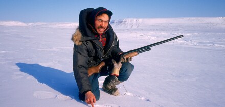 Hunter, Polar bear tracking, Franklin Island, Nunavut, Canada