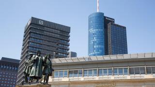 Statue beneath Financial district skyscrapers with Deutsche Bank building and Main Tower Helaba, Frankfurt am Main, Hessen, Germ