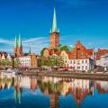 Historic skyline along the Trave river in the old town of Lubeck, Germany on a summer day