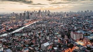 Asia, East Asia, Philippines, Manila, Makati and Pasig river, business district, skyscrapers, city skyline, sunset view. Image shot 2016. Exact date unknown.