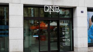 Oslo, Norway - June 20, 2019: Exterior view of the DNB bank office entrance at the 27 Karl Johans gate situated in the downtown district.