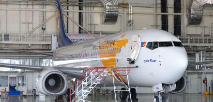 MIAT Mongolian Boeing 737 inside the maintenance hangar at Ulaanbaatar Airport. Aircraft hangar for MIAT Mongolian.  MIAT Mongolian Airlines MRO.