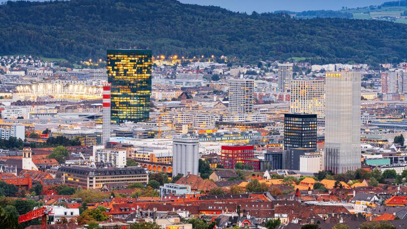 Zurich, Switzerland with modern high rises at twilight.