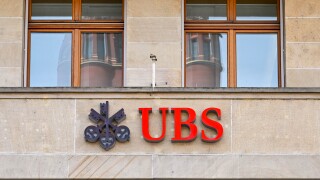 Basel, Switzerland - April 2022: Sign above the entrance to a br