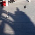 Coronavirus / Covid 19 outbreak, March 24th. 2020. Only few people on the square in front of Cologne central station, shadow of the cathedral, Germany