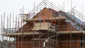 File photo dated 07/01/20 of houses under construction on a housing development in Basingstoke, Hampshire. The UK's construction sector saw growth ease back last month after striking a two-year high in September, according to new data. It was partly drive