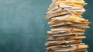 Stack file folders with documents on background