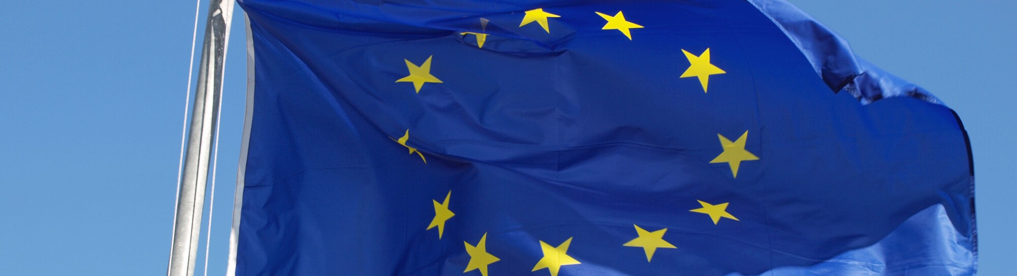 European flag on blue sky