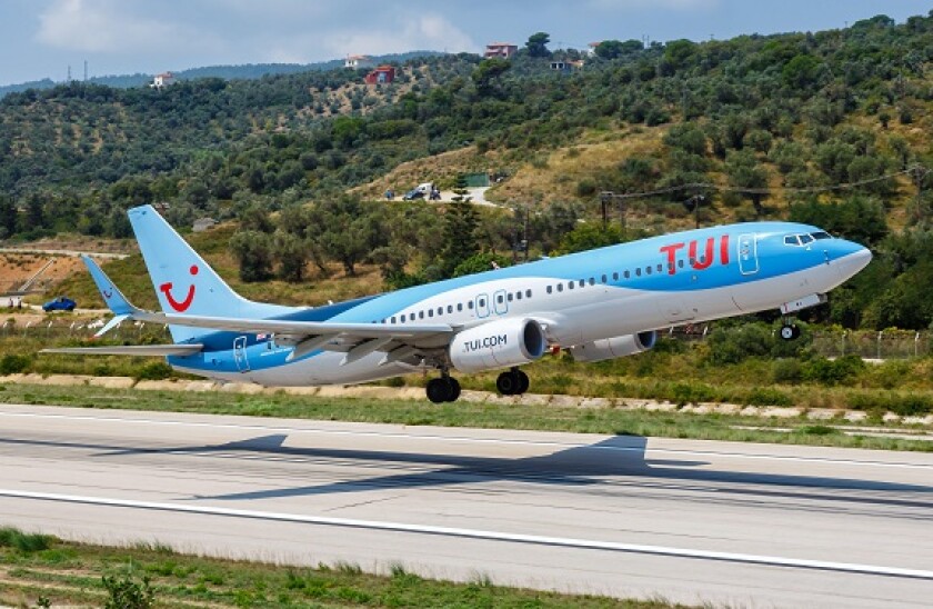 Skiathos, Greece ? August 2, 2019: TUI Boeing 737-800 airplane at Skiathos airport (JSI) in Greece. Boeing is an American aircraft manufacturer headqu