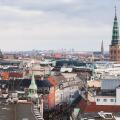 Copenhagen cityscape with spire of ol City Hall at winter day. Photo taken from The Round Tower, popular old city landmark and viewpoint. Denmark
