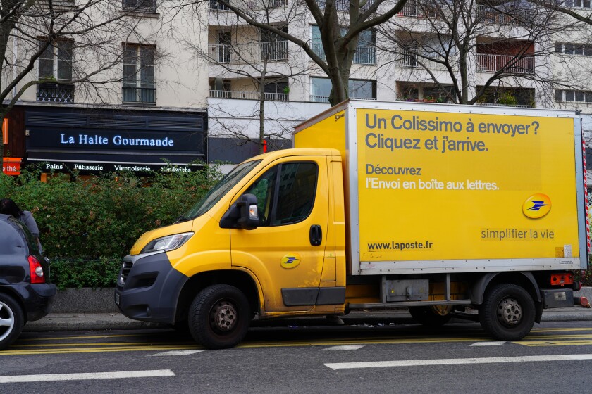 PARIS, FRANCE -5 JAN 2021- View of a La Poste mail delivery van