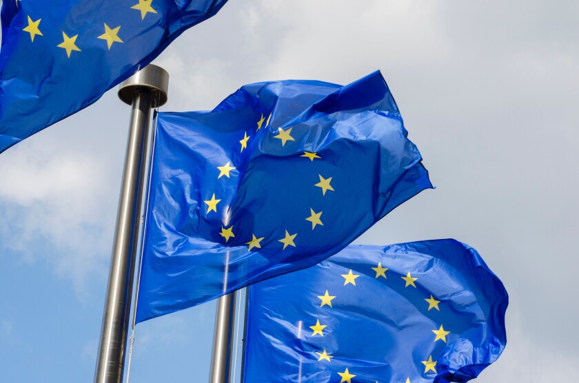 EU flags in front of European Commission in Brussels