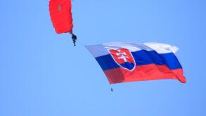 parachutist with Slovakai flag in the air at SIAF airshow in Sliac, Slovakia
