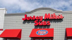 Oshkosh, WI - 25 July 2020:  A storefront sign of Jersey Mikes subs since 1956