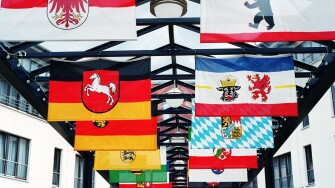 Flags of German states in front of Hotel Esplanade Resort and Spa, Bad Saarow, Germany