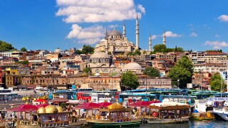 The Suleymaniye Mosque  on the Third Hill with a ferries on the banks of the Golden Horn, Istanbul Turkey