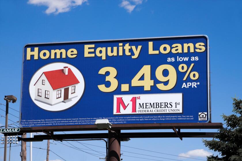 Billboard sign advertising home equity loans via Members 1st Federal Credit Union.