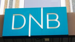 Trondheim, Norway - September 26, 2015: Close-up of the sign at the DNB office entrance. DNB is a Norwegian financial services group.