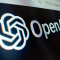 Close-up view of OpenAI logo on its website, shot with macro probe lens