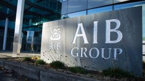 Dublin, Ireland. 03rd Dec, 2018. The lettering of the Irish commercial bank AIB (Allied Irish Banks) can be seen next to the entrance to the bank's head office. Credit: Christian Charisius/dpa/Alamy Live News