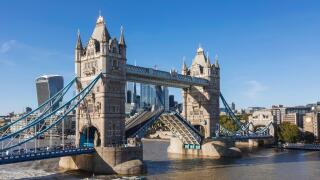 England, London, Tower Bridge with Uber Boat on River Thames