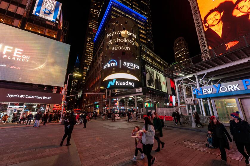 The giant digital screen on Nasdaq headquarters in Times Square in New York promotes Amazon?s ?buy now pay later? payment scheme Affirm on Wednesday, November 8, 2023.(© Richard B. Levine)