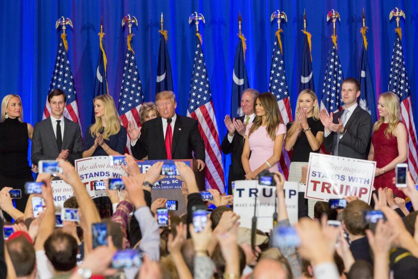 Billionaire and GOP presidential candidate Donald Trump acknowledges cheering supporters along with his family as they celebrate victory in the South Carolina Republican primary February 20, 2016 in Spartanburg, South Carolina, USA .