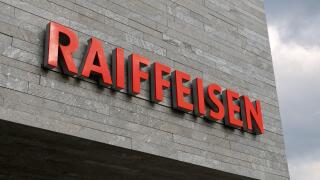 Wohlen, Aargau, Switzerland - 15th April 2021 : Swiss Raiffeisen bank sign on a concrete facade in Wohlen. Raiffeisen is a Swiss cooperative bank, the