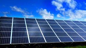 Solar farm with large solar panels in an array, France, Europe