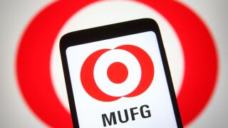 Ukraine. 18th May, 2021. In this photo illustration the Mitsubishi UFJ Financial Group (MUFG) logo of a Japanese bank holding and financial services company is seen on a smartphone and a pc screen. Credit: Pavlo Gonchar/SOPA Images/ZUMA Wire/Alamy Live Ne