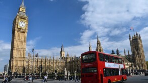Red double-decker bus in front of the British Parliament, London, England, United Kingdom, Europe