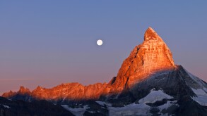 Switzerland, Valais, Zermatt, the Gornergrat,moon setting over the Matterhorn at dawn