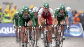 (dpa) - Team Credit Agricole, led by Norwegian cyclist Thor Hushovd (C), rides during the 64.5 km long fourth stage of the Tour de France from Cambrai to Arras, France, 7 July 2004. Heavy rains throughout the stage caused many crashes and defects. The tea