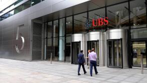 Entrance of 5 Broadgate UBS building exterior HQ headquarters sign people  financial services investment bank in the City of London UK   KATHY DEWITT