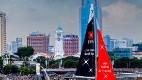 Sailing At The Bay, A DBS Sailboat Sails In Front Of The Merlion Park Area, Singapore, South East Asia