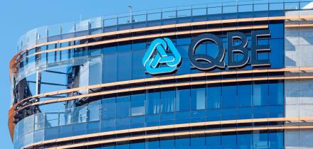 The logo and name of the Insurance giant, QBE on a building in Parramatta, Sydney, New South Wales, Australia